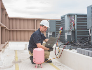 HVAC Technician with panel